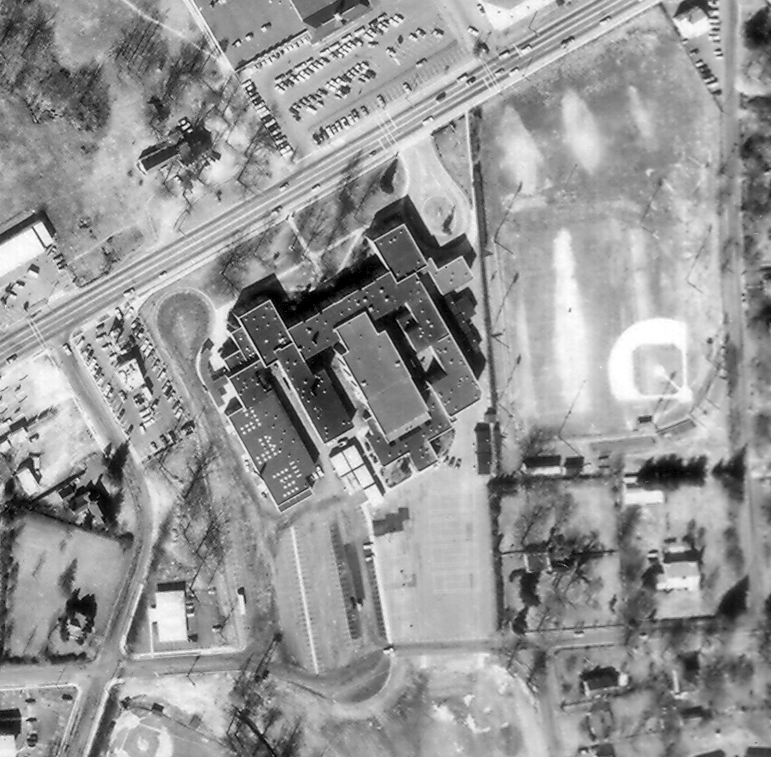 Black and white aerial photograph of the old Fairfax High School taken in 1968. The building has been added onto significantly since it first opened. 